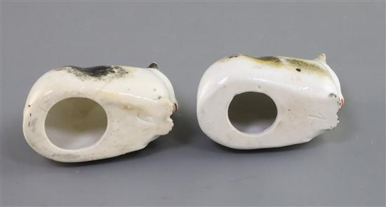 Two Derby porcelain figures of recumbent cats, c.1830, L. 6cm, one with hairline cracks